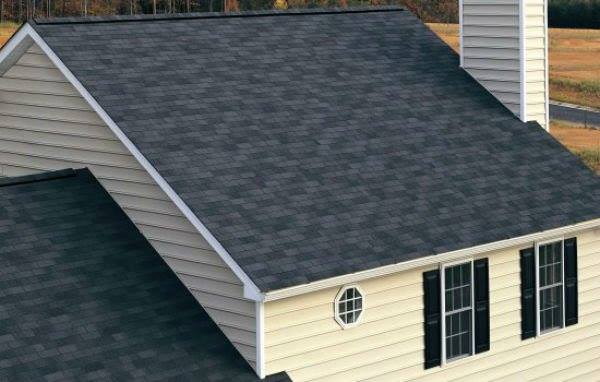 grove roofing repair services on homewith a beautiful blue sky