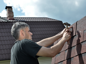 DIY homeowner attempting roof repair in Colcord, OK