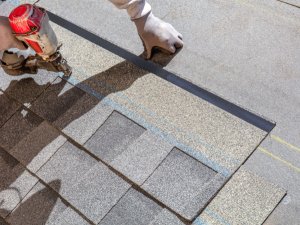 Husong Roofing Service professionals installing energy-efficient roofing in Springdale